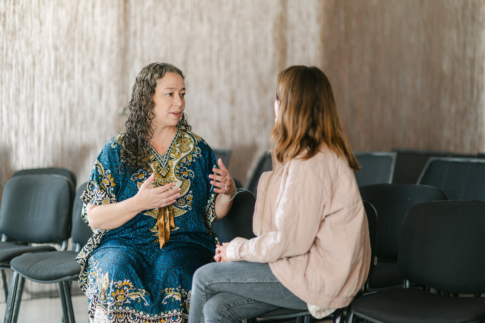 Doctor speaking with a patient at Hope4Cancer