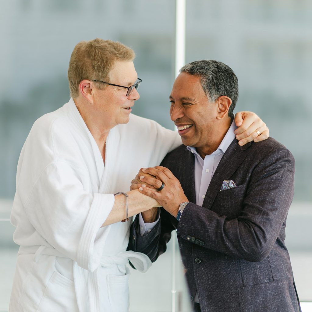 Dr. Tony Jimenez with a patient at Hope4Cancer