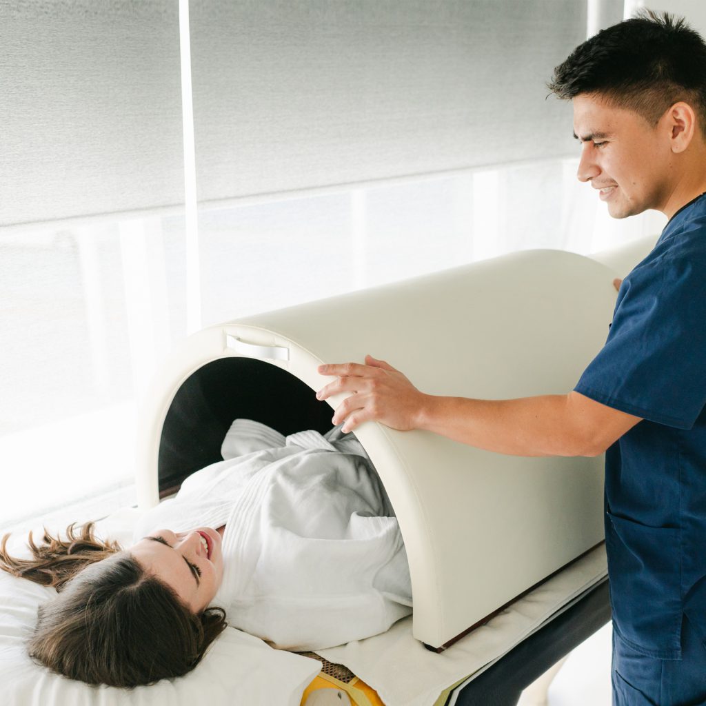 A doctor and patient at Hope4Cancer