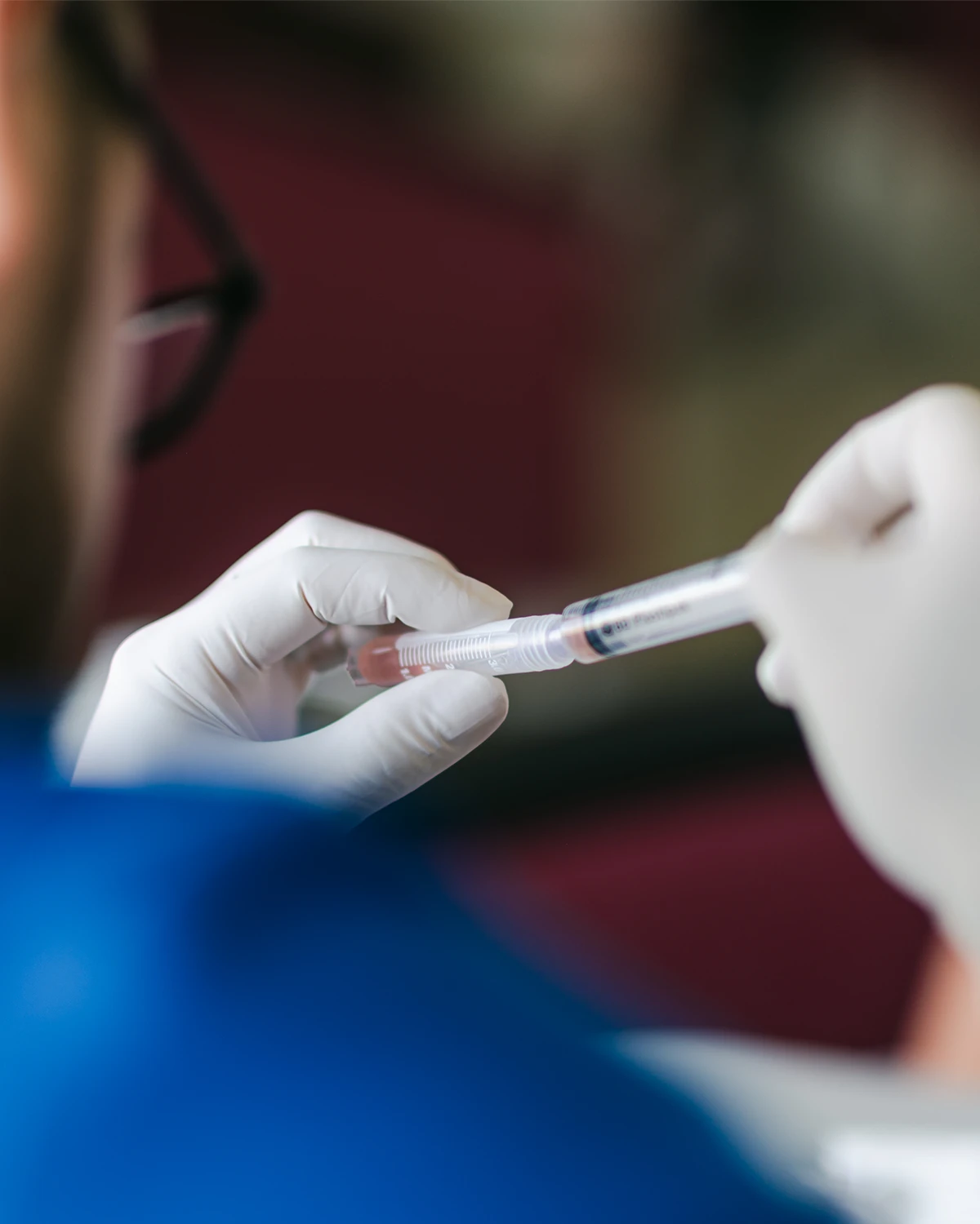 A nurse administering medicine