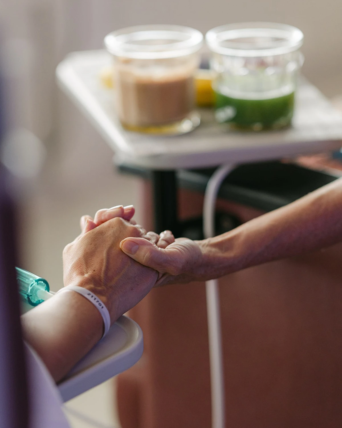 A photo of people holding hands